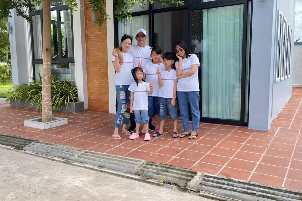 Family in Front of our Luxury Villa in Kampot - Damnak Borey Resort