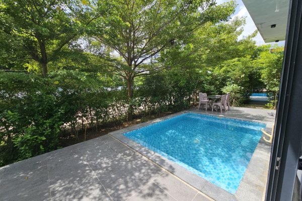 Outside view with big pool at family villa at damnak borey resort in kampot