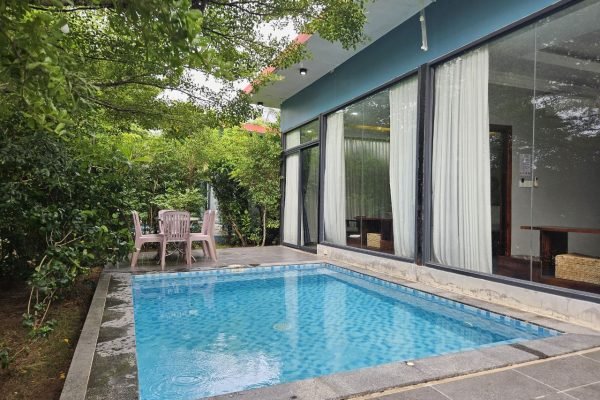 Big private pool with outside sitting at family villa - Damnak borey resort kampot